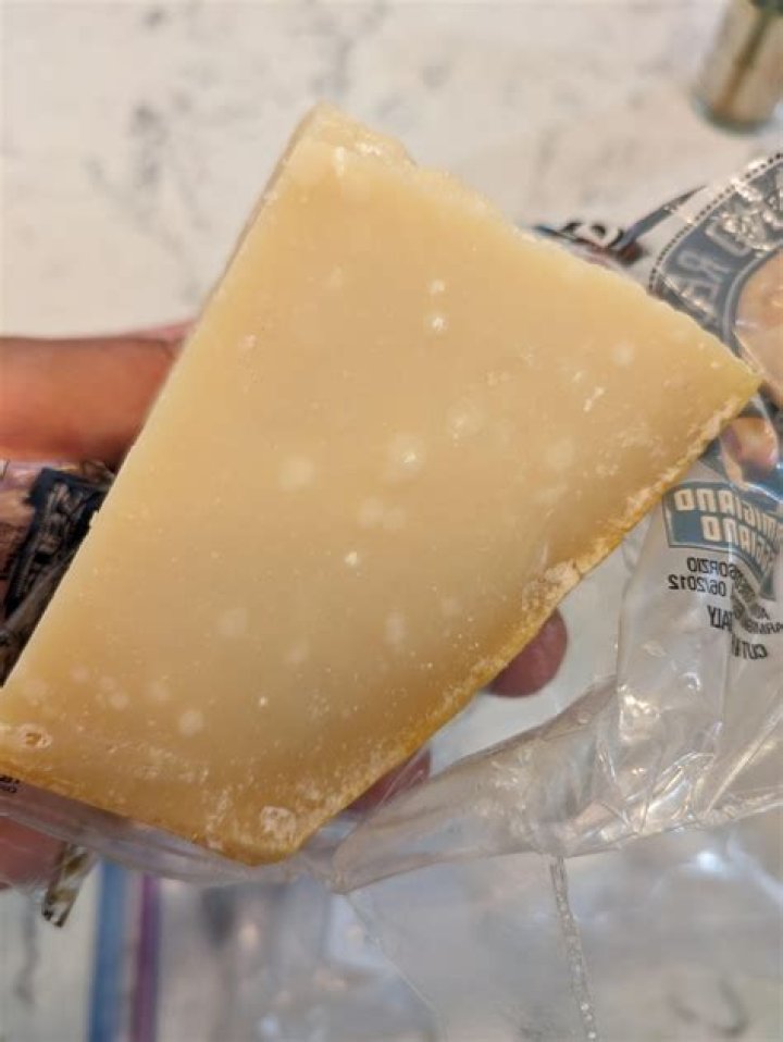 Does parmigiano reggiano have white spots?